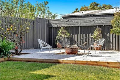 Port Noarlunga South paved backyard firepit area Paved firepit seating area and landscaped garden in a renovated Port Noarlunga South yard