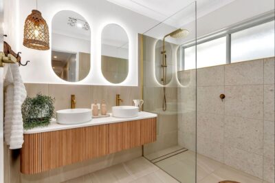 Port Noarlunga South bathroom renovation, double vanity Renovated main bathroom with a fluted timber double vanity, brass tapware and walk-in shower