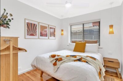 Port Noarlunga South bedroom renovation Renovated bedroom with restored hardwood flooring and new interior painting