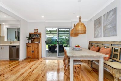Port Noarlunga South dining area renovation Renovated dining area with sliding doors opening to the covered pergola