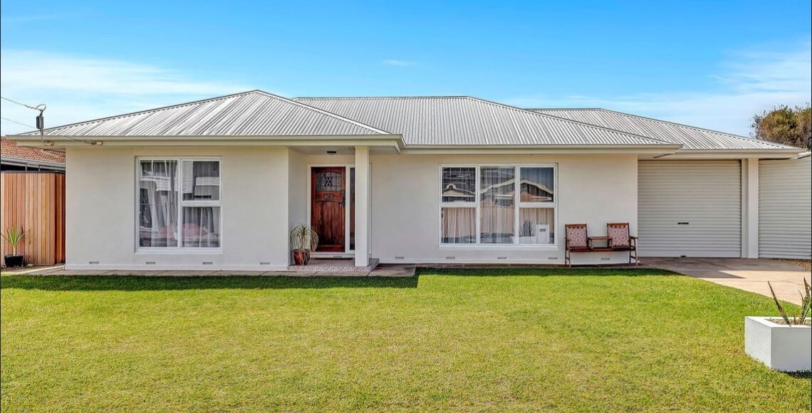 Renovated Port Noarlunga South home with a new roof and rendered white exterior