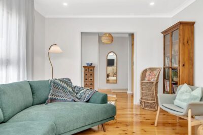 Port Noarlunga South living room with restored hardwood floors Living room with resanded and polished hardwood floors after a full house renovation